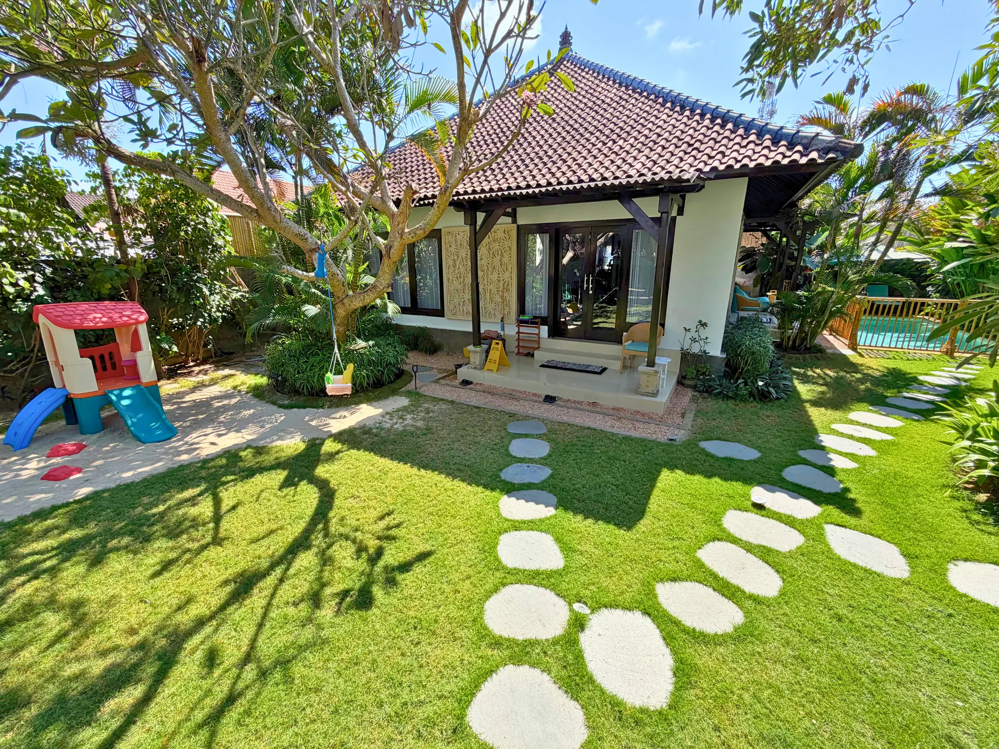 Outdoor children's play area at The Santi Estate in Sanur