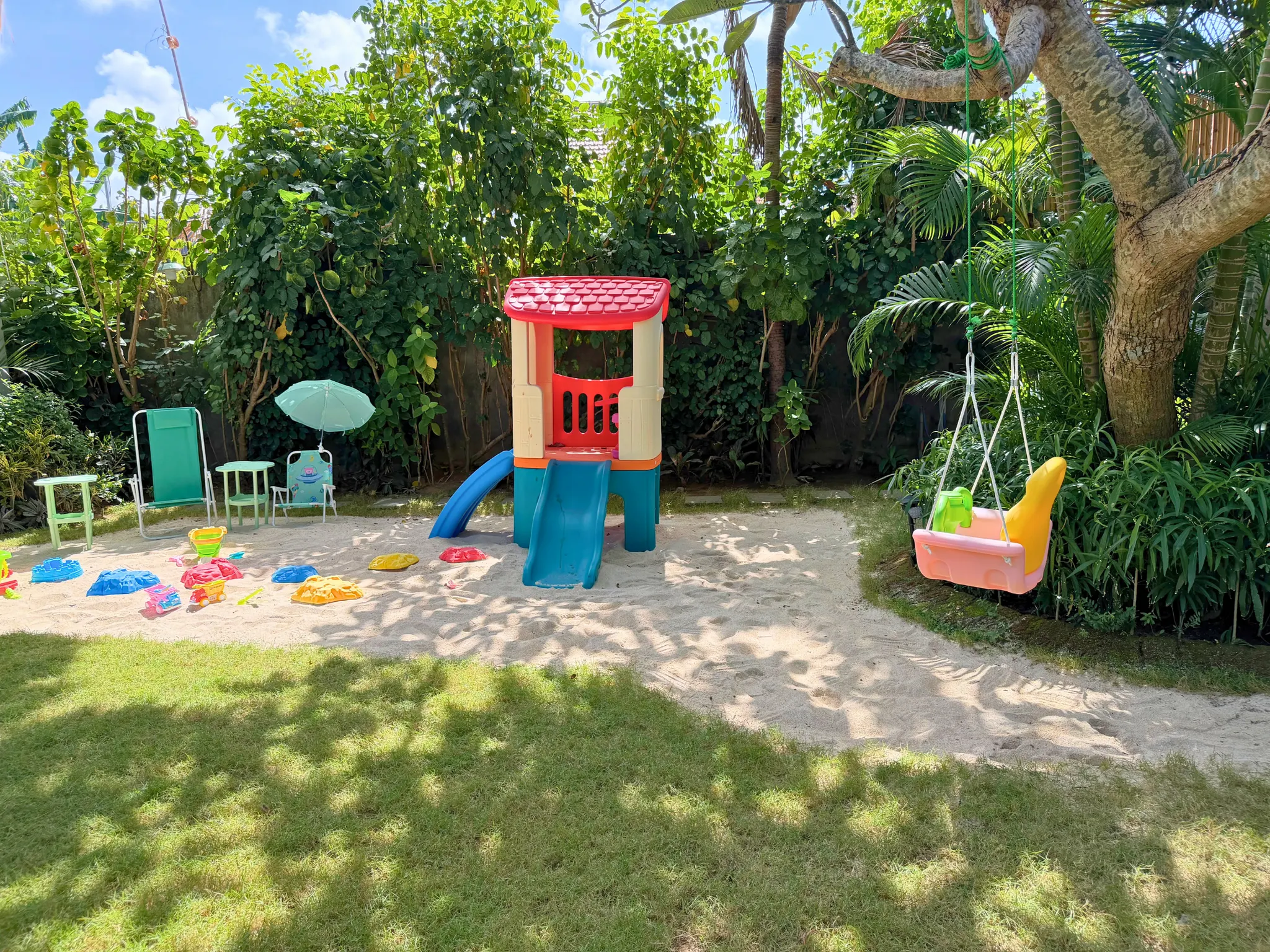 Children's natural-sand playground at The Santi Estate in Sanur