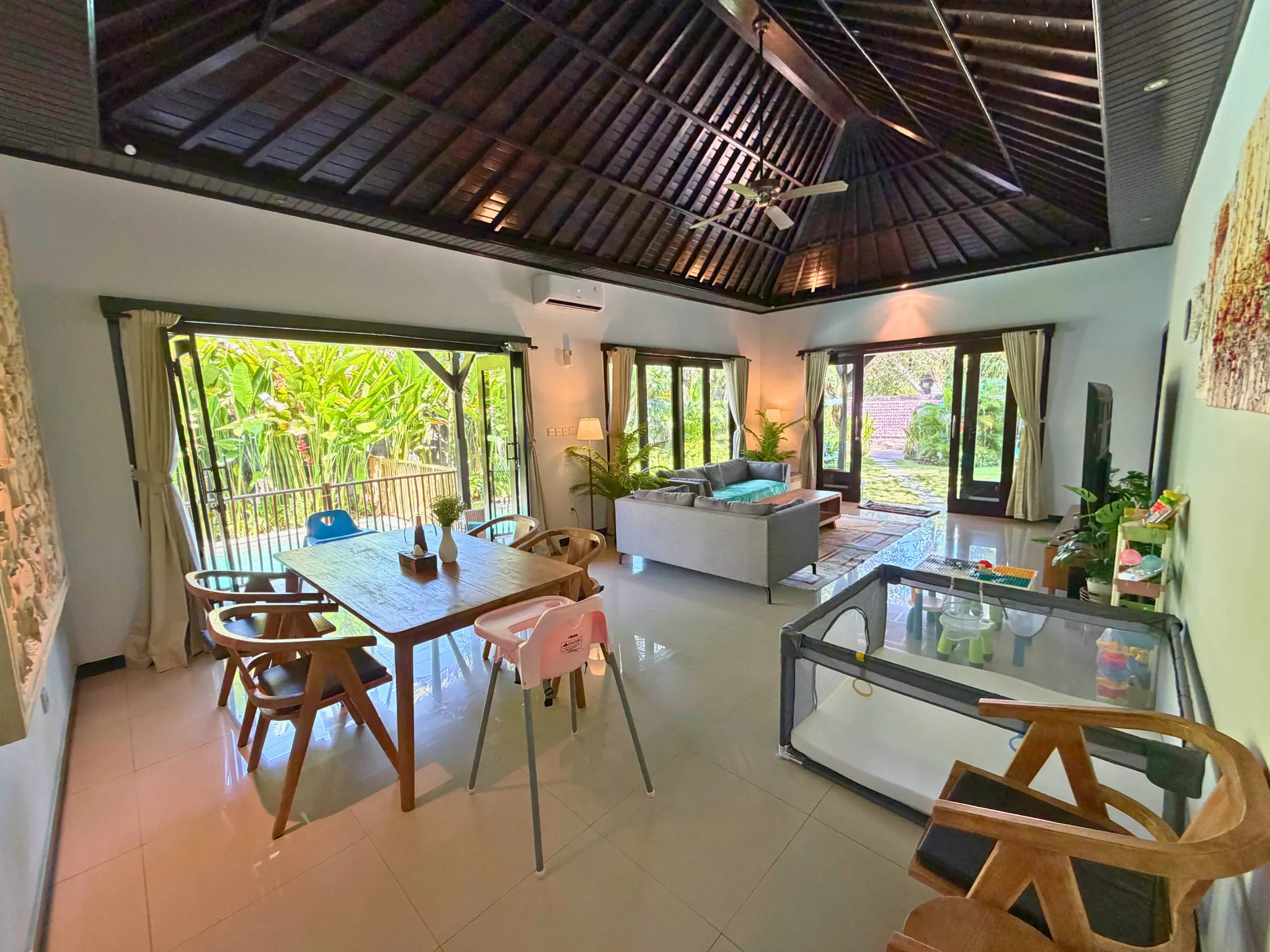Kitchen, dining and living area at The Santi Estate in Sanur